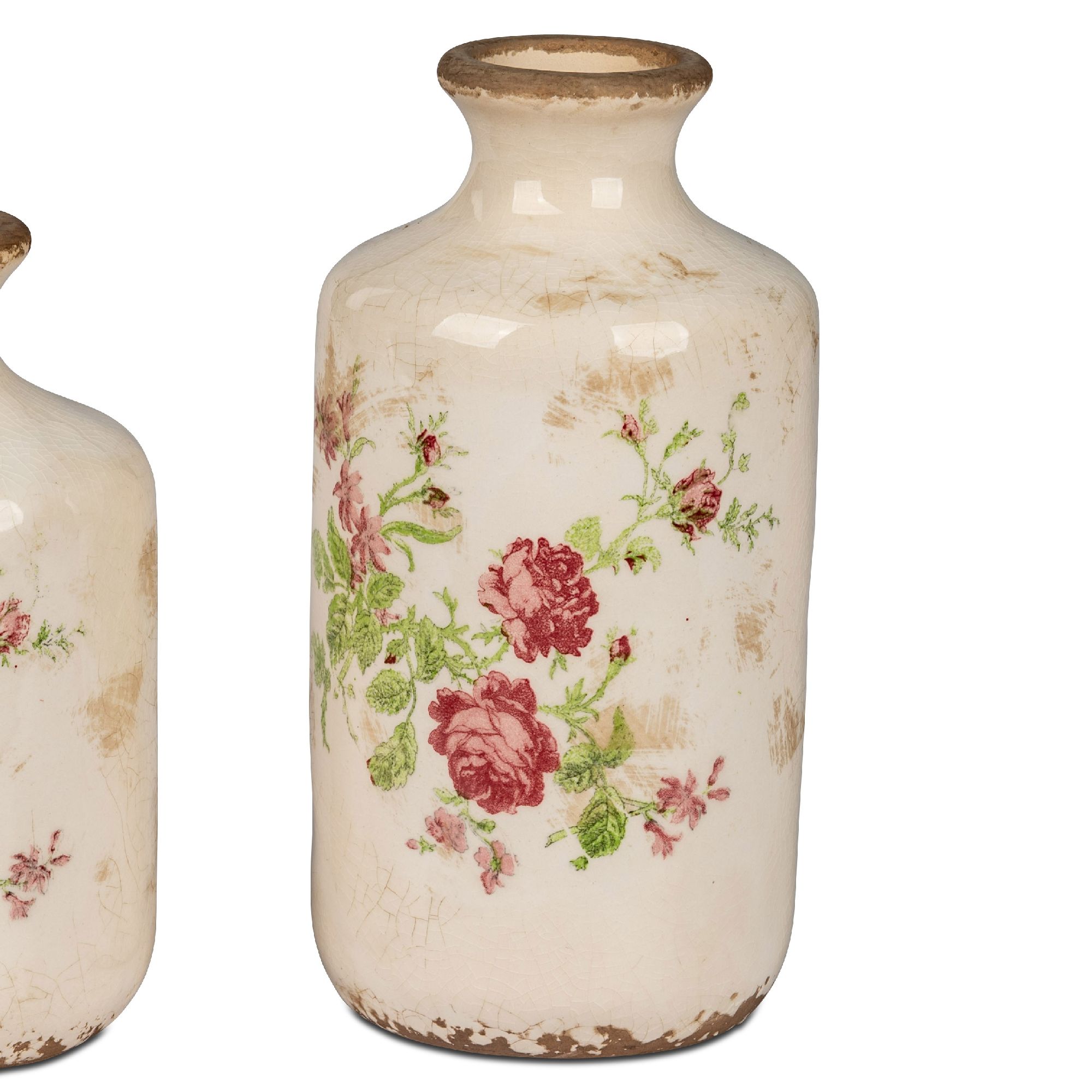 Zwei dekorative Vasen aus Keramik mit blütenförmigen Mustern in Rot und Grün auf einem cremefarbenen Hintergrund.