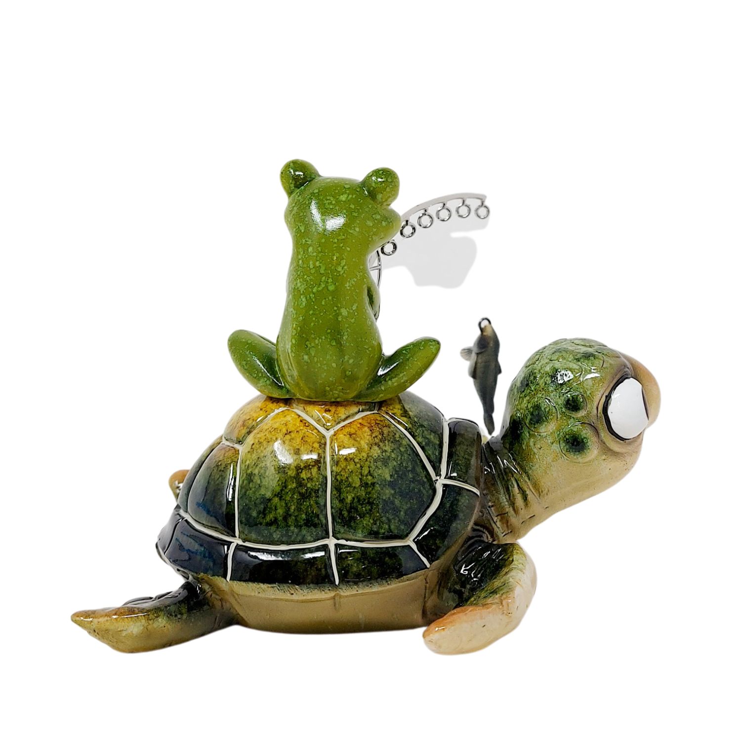 Grüner Frosch mit Angel und Fisch sitzt auf einer grünen Schildkröte