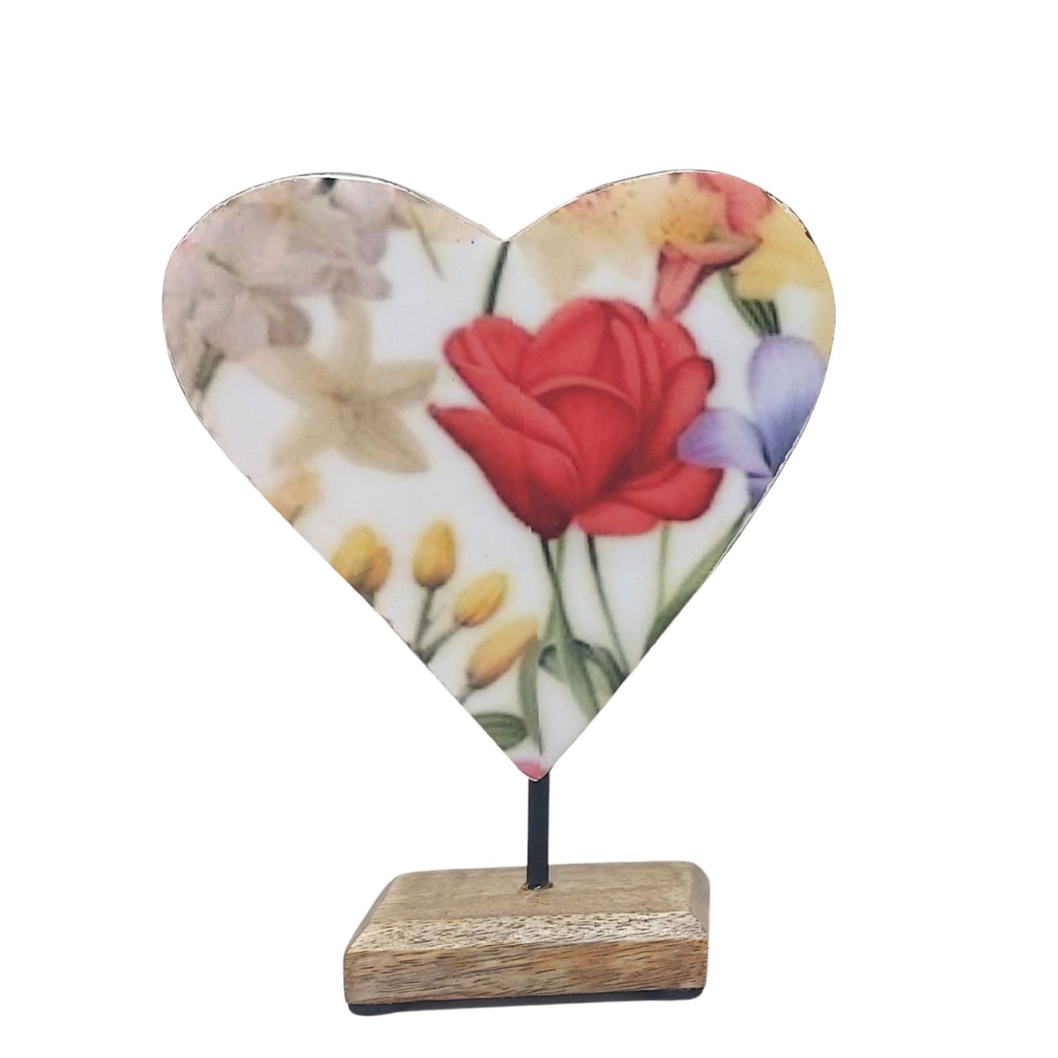 Herz aus Dekor mit bunten Blumenmotiven auf einem Holzsockel