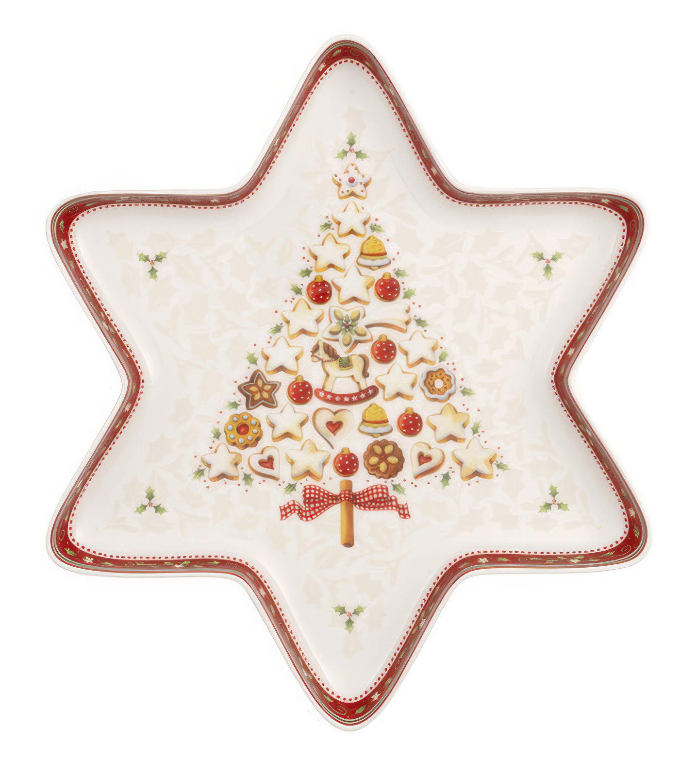 Ein sternförmiger Teller mit einem Weihnachtsbaum-Motiv aus Plätzchen und einer roten Umrandung.