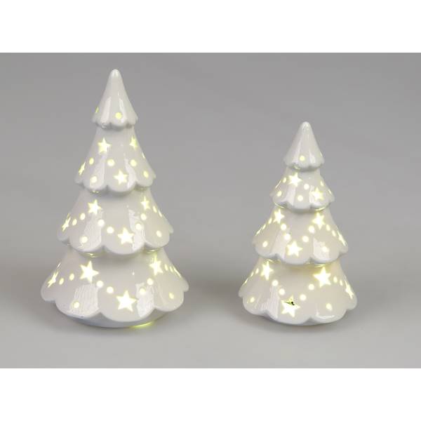 Zwei weiße Weihnachtsbäume aus Keramik, einer größer als der andere, mit leuchtenden Sternenmustern.