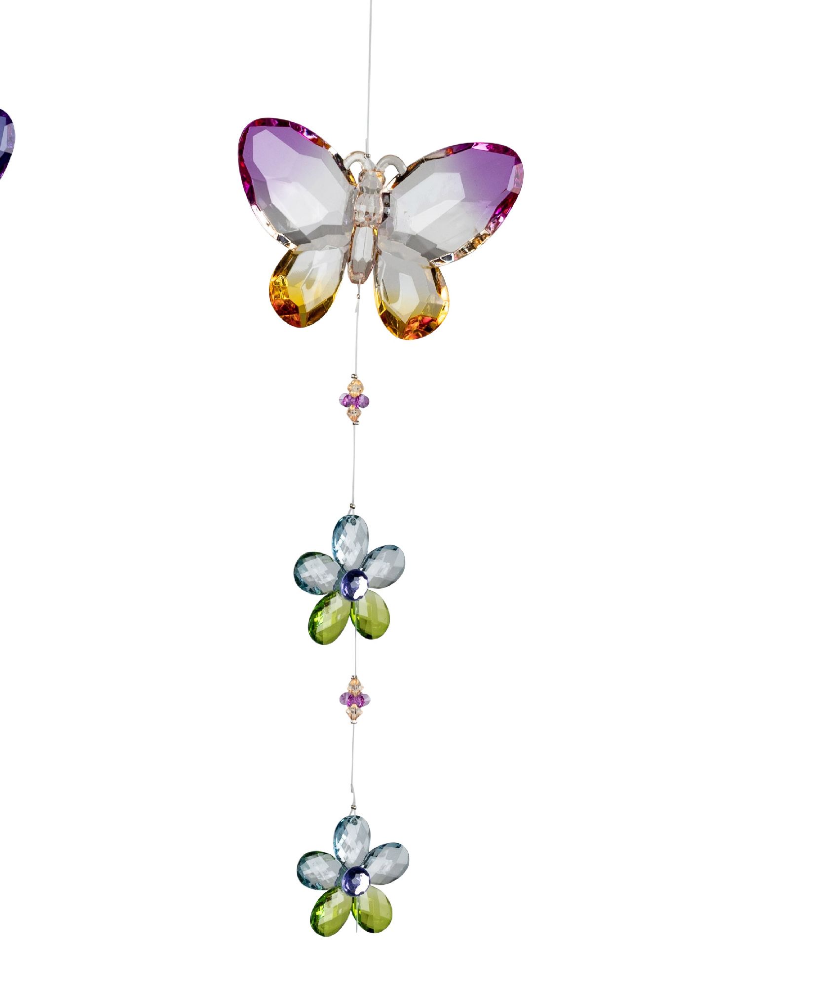 Bunte, glitzernde Dekoration in Form eines Schmetterlings und zwei Blumen, die an einer Schnur hängen.