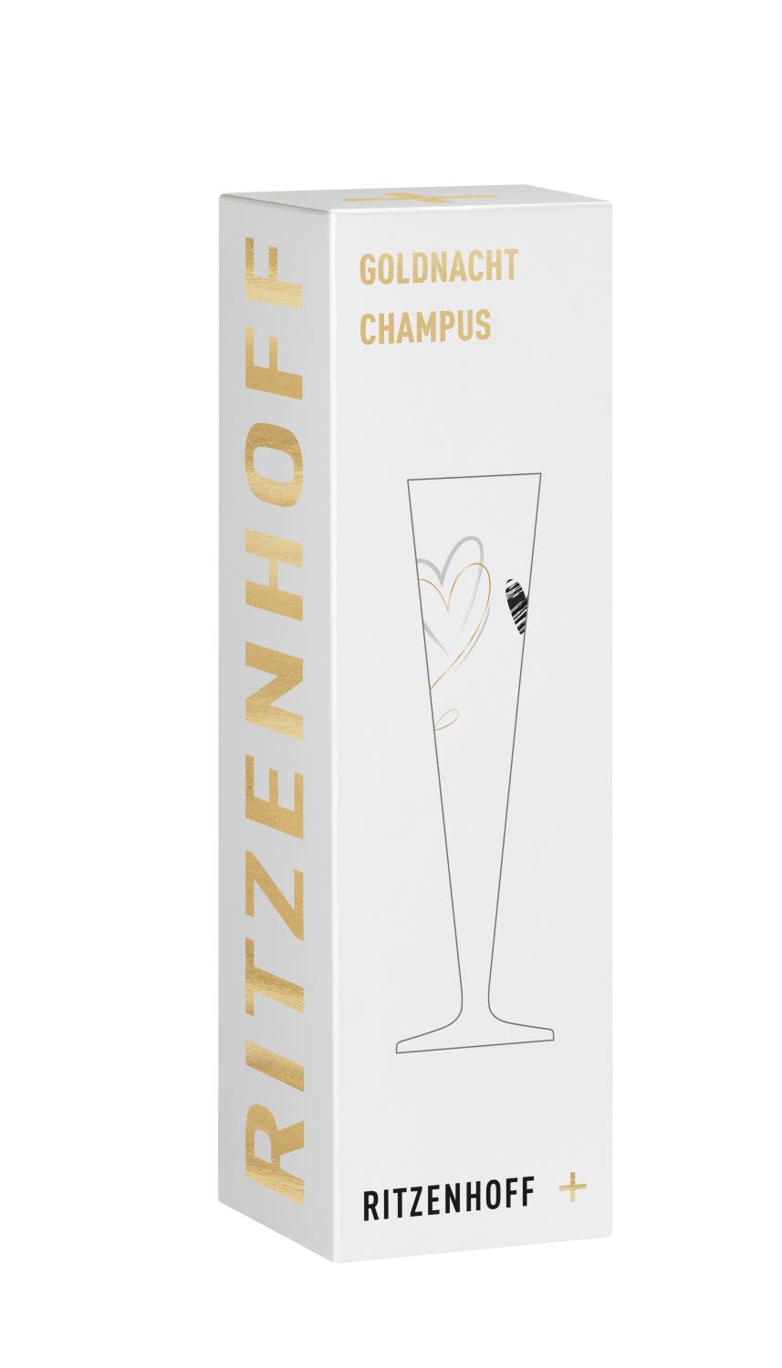 Weißer Karton mit goldener Schrift, darauf ein Glas mit Herz-Design. Beschriftung: "Goldnacht Champus" und "Ritzenhoff".