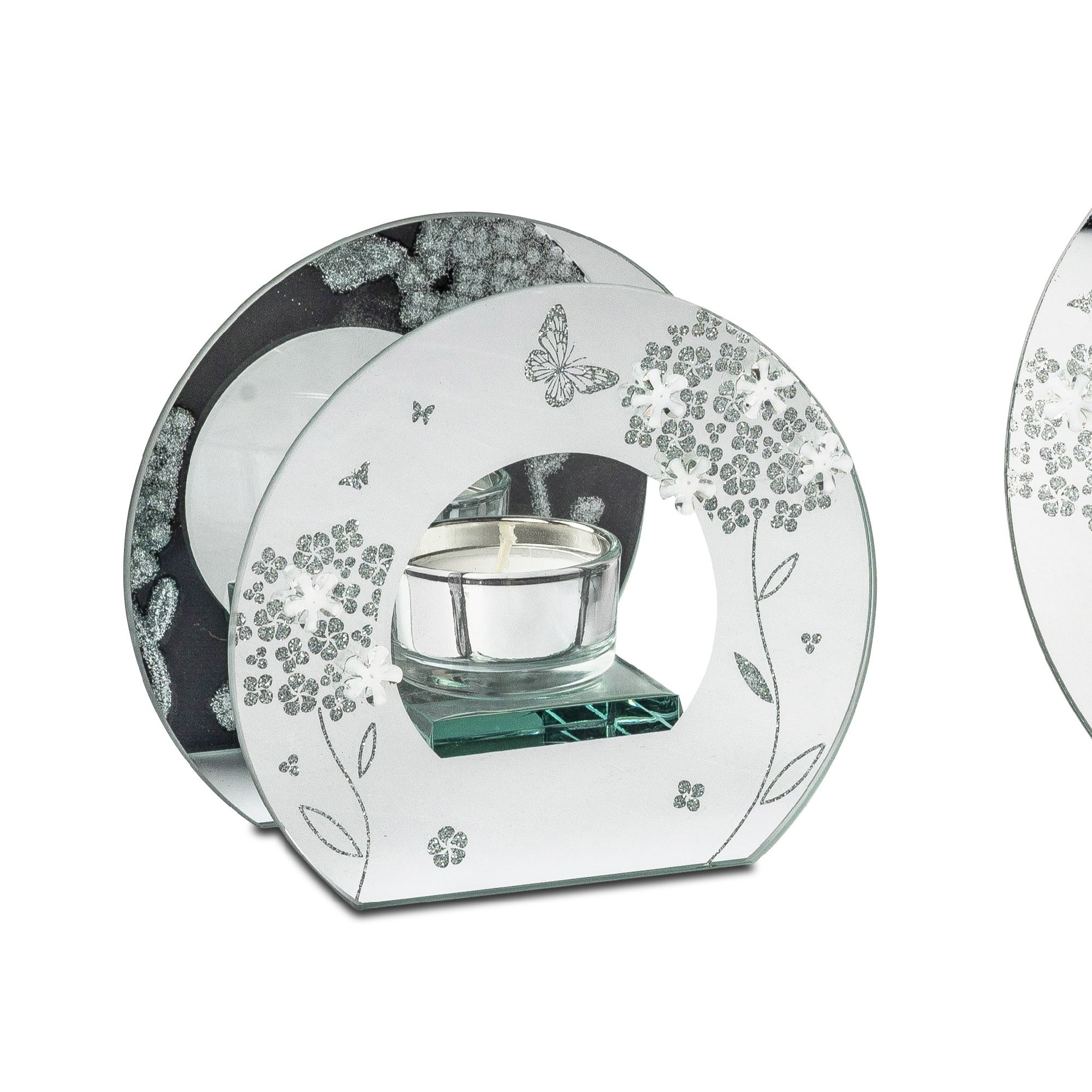 Ein dekorativer Teelichthalter aus Glas in runder Form mit floralen Motiven und einem Glasbehälter für das Teelicht.