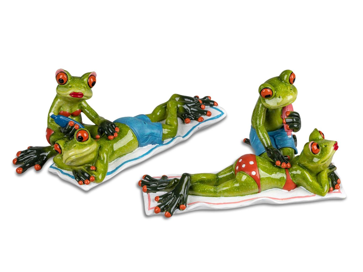 Zwei Gruppen von bunten Froschfiguren, die auf Liegen liegen. Eine Gruppe erhält eine Massage, die a