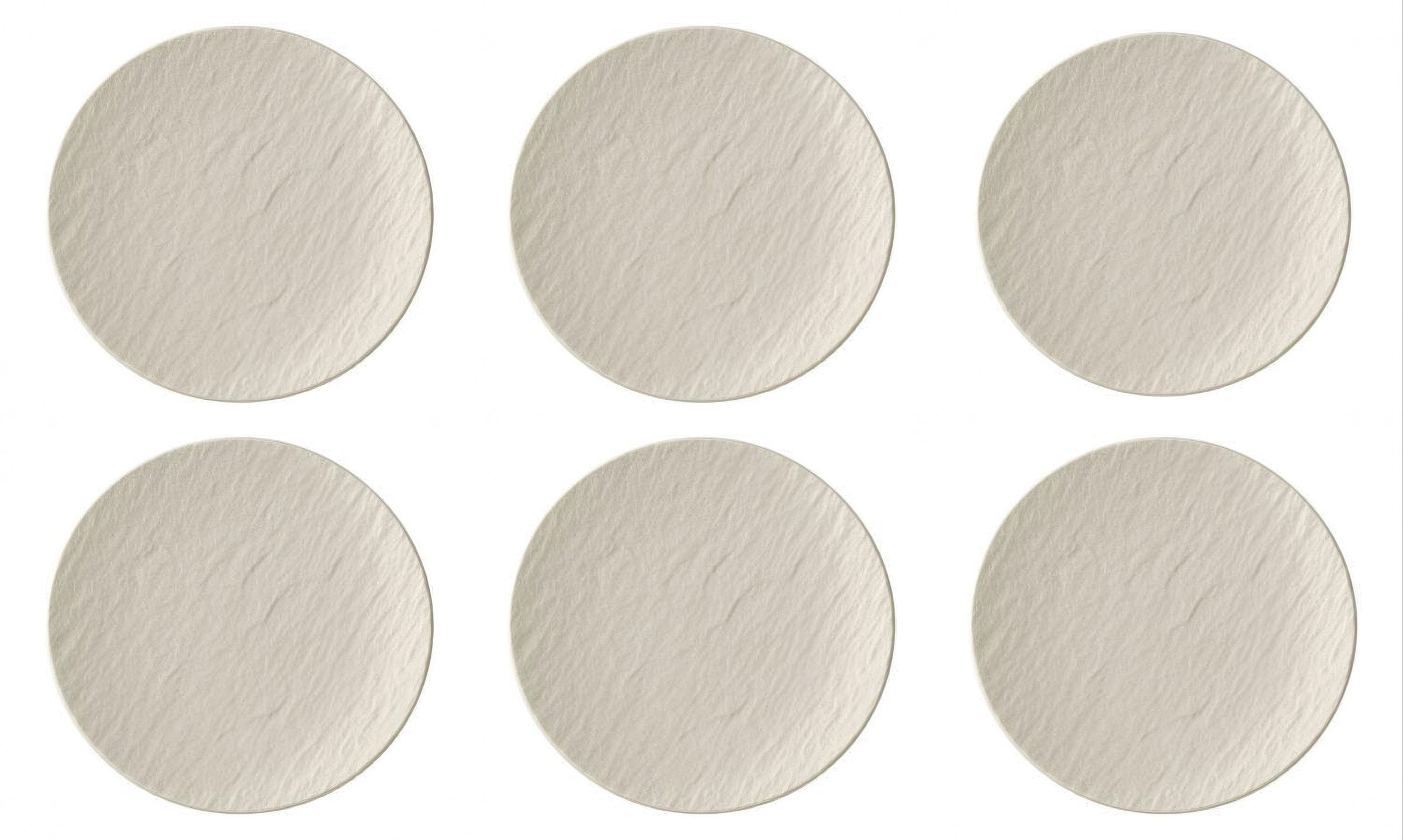 Sechs gleich große, runde, beige Flächen mit einer strukturierten Oberfläche, angeordnet in zwei Rei