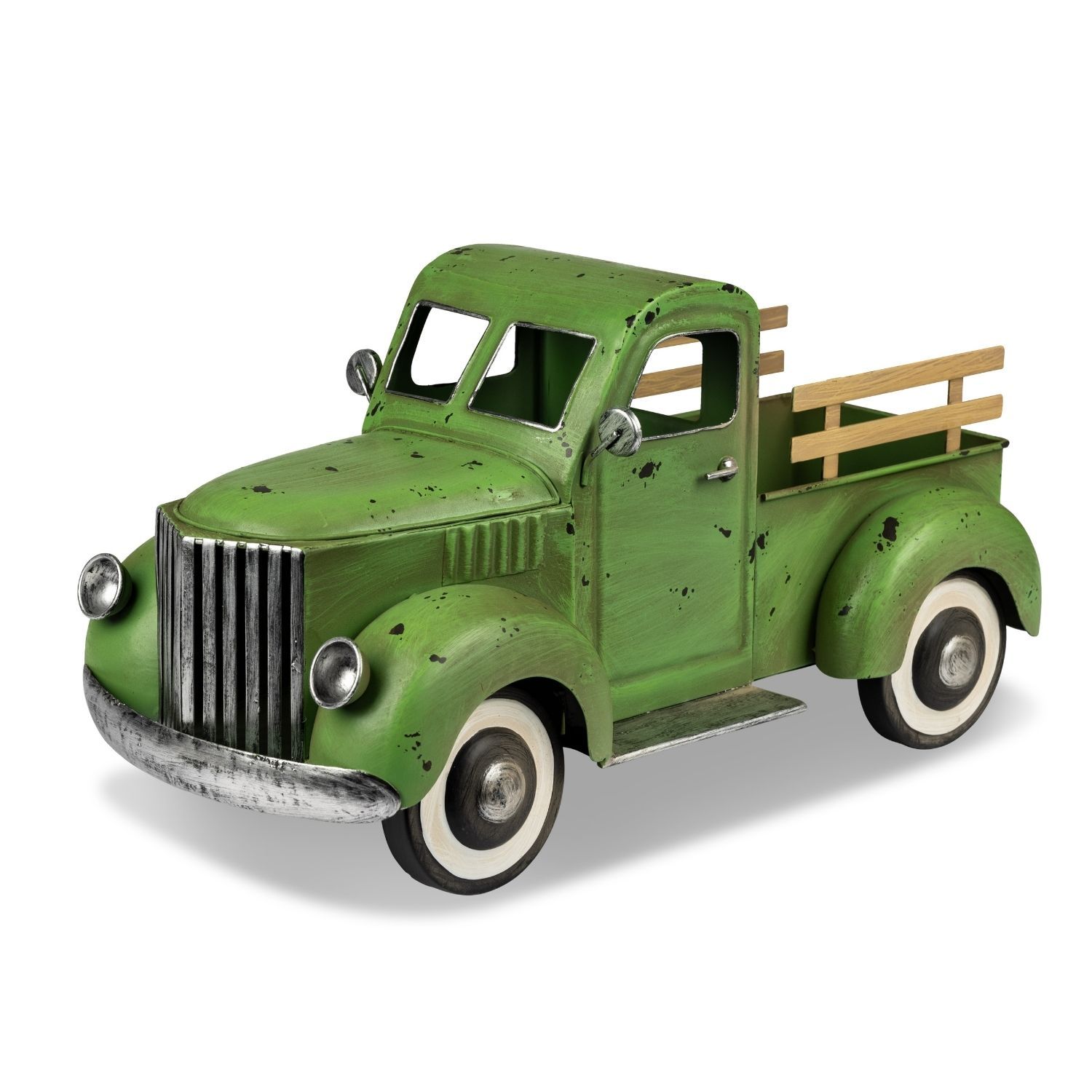 Ein grüner Spielzeug-Lkw mit Holzpritsche und abgenutztem Look