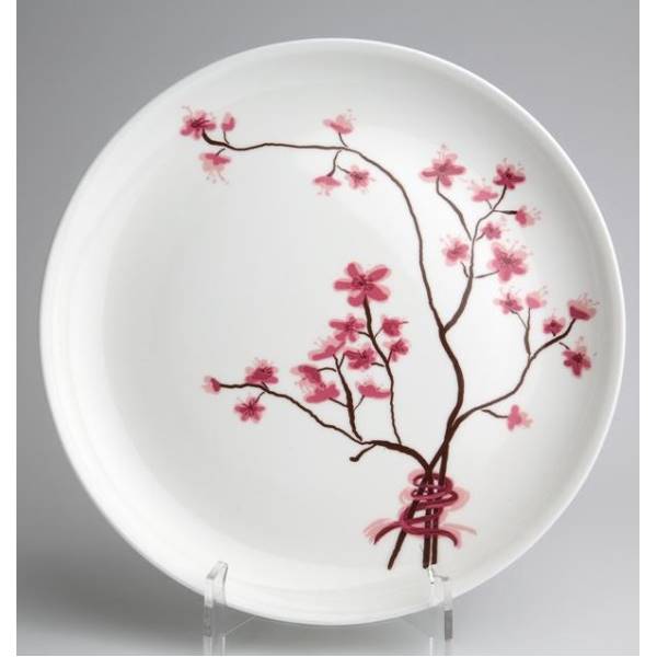 Runder Teller mit blühendem Kirschbaum-Motiv in Pink auf weißem Hintergrund. Der Teller steht auf einem transparenten Ständer.
