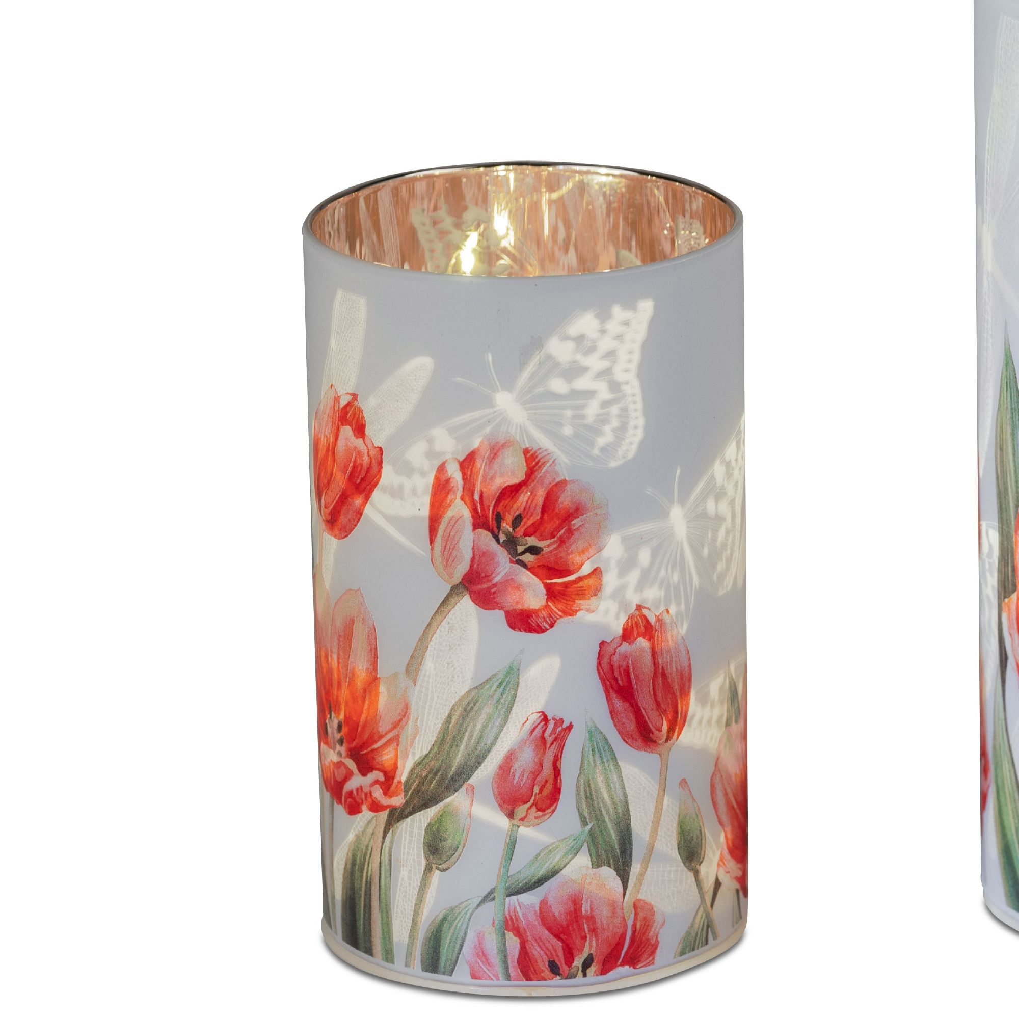 Zwei dekorative Kerzenhalter mit roten Tulpenmotiven und einem schimmernden Innenraum.
