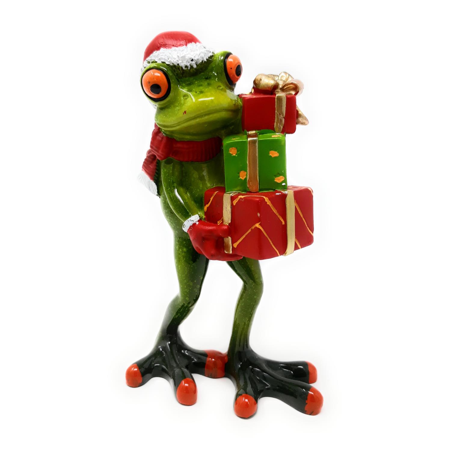 Eine grüne Froschfigur trägt einen Weihnachtsmann-Hut und einen Schal, während sie Geschenke in den
