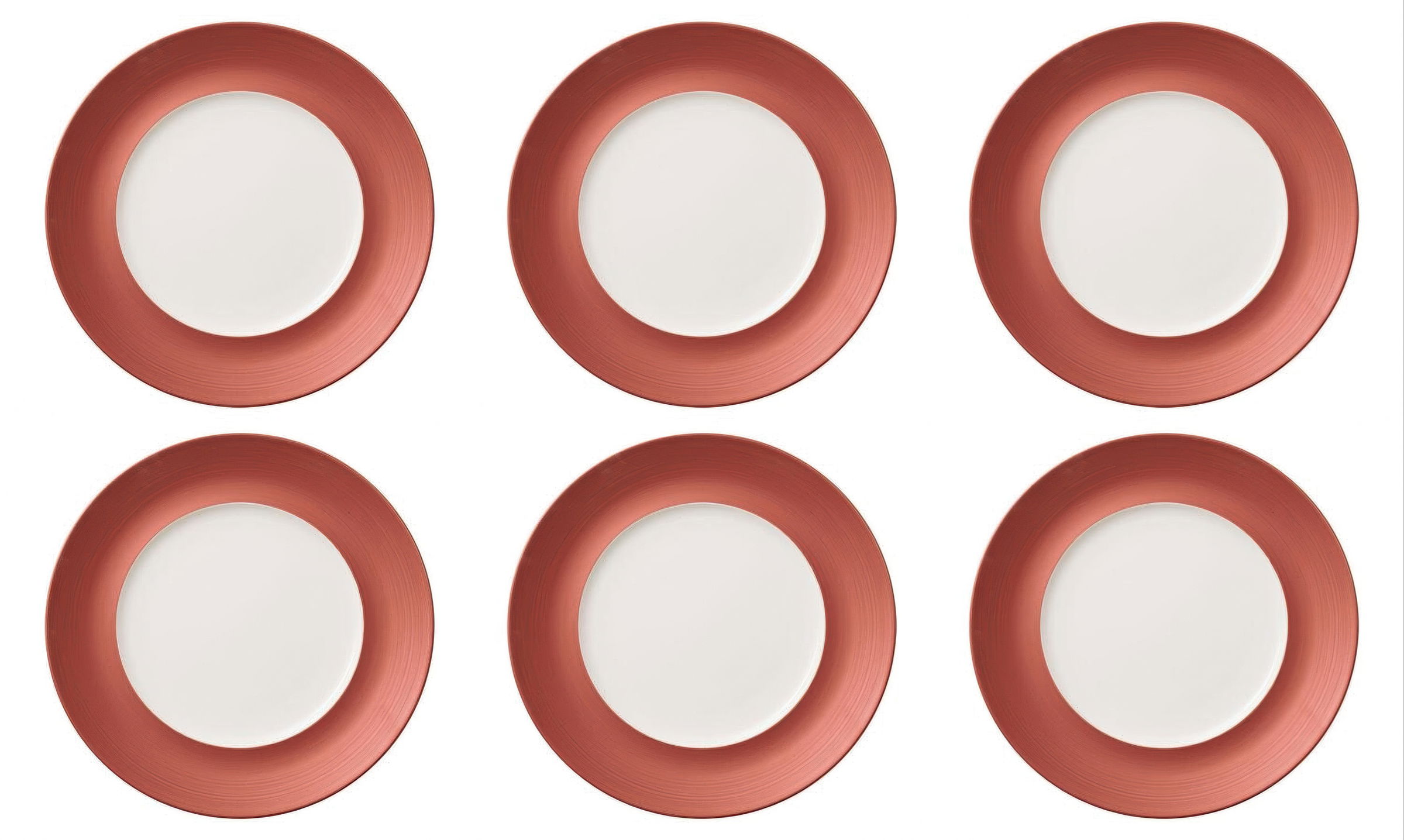 Sechs runde Teller mit rotem Rand und weißer Mitte, gleichmäßig angeordnet.
