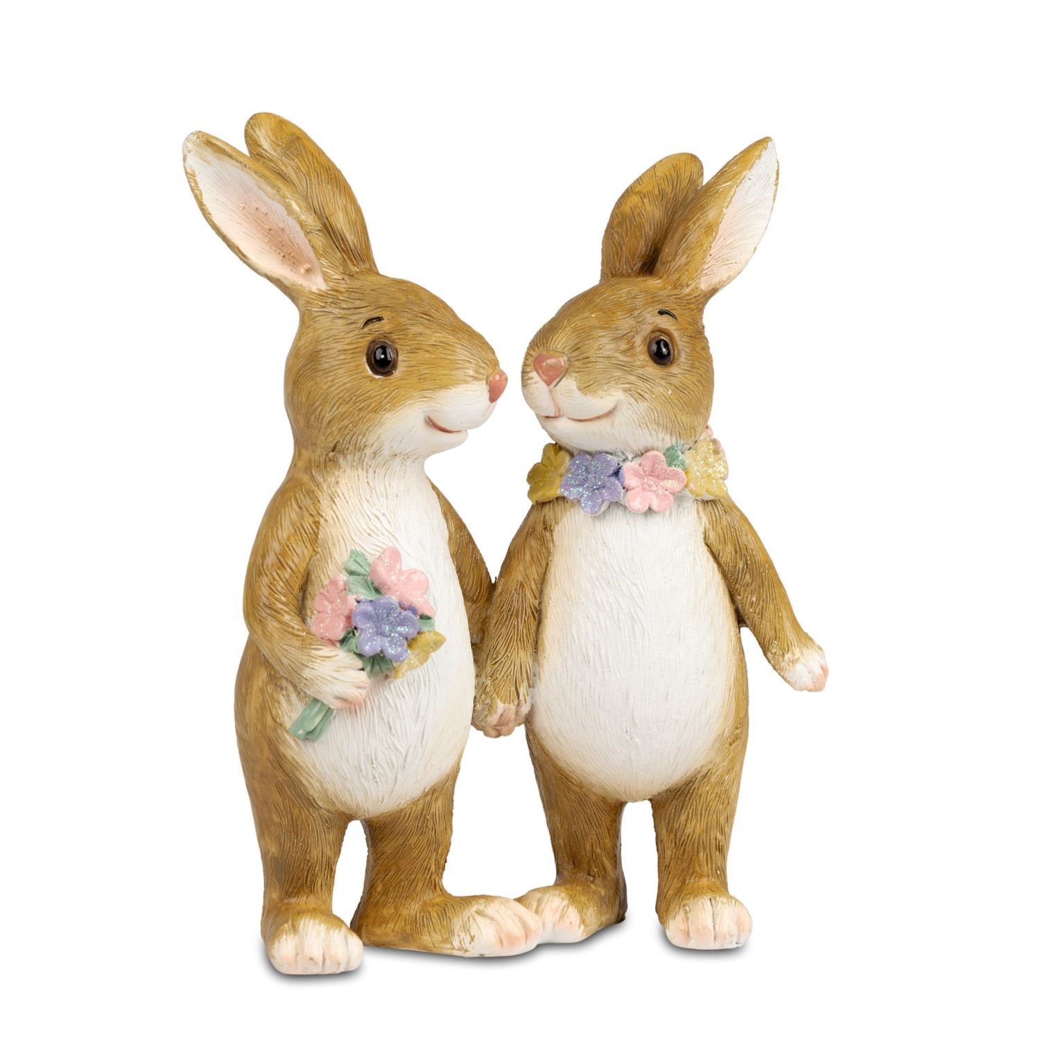 Zwei Hasenfiguren halten Händchen, eine mit Blumenstrauß, beide mit Blumenkränzen