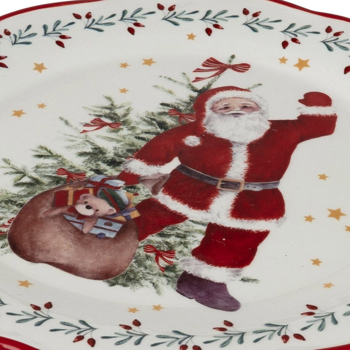 Ein Teller mit einem Weihnachtsmann in rotem Anzug, der einen Sack mit Geschenken und einem Teddybär