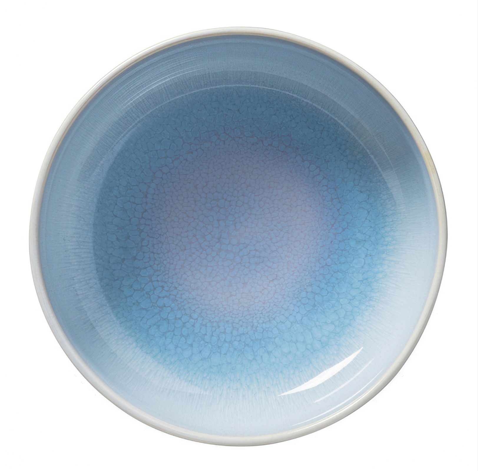 Runde Schale in sanften Blautönen mit einem strukturierten, glasierten Finish. Der Rand ist weiß.