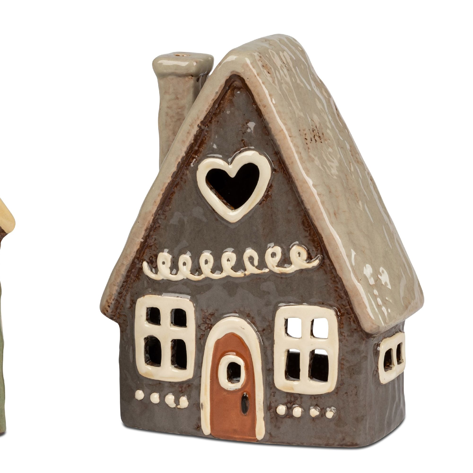 Zwei dekorative, keramische Häuser in verschiedenen Farben, eines mit Herzfenster und geschwungenen