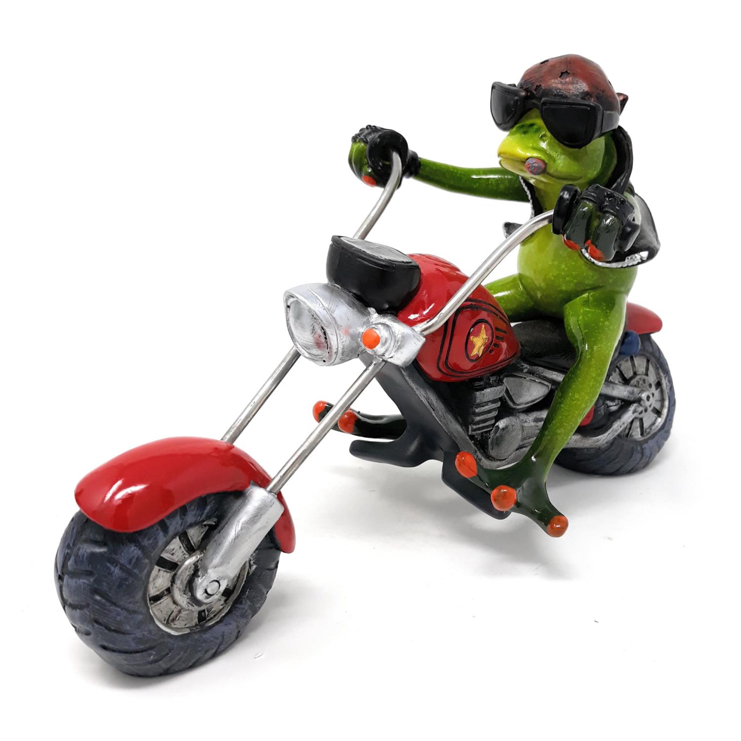 Eine grüne Froschfigur mit Sonnenbrille und Lederjacke sitzt auf einem roten Motorrad. Die Figur hat einen lässigen Ausdruck.