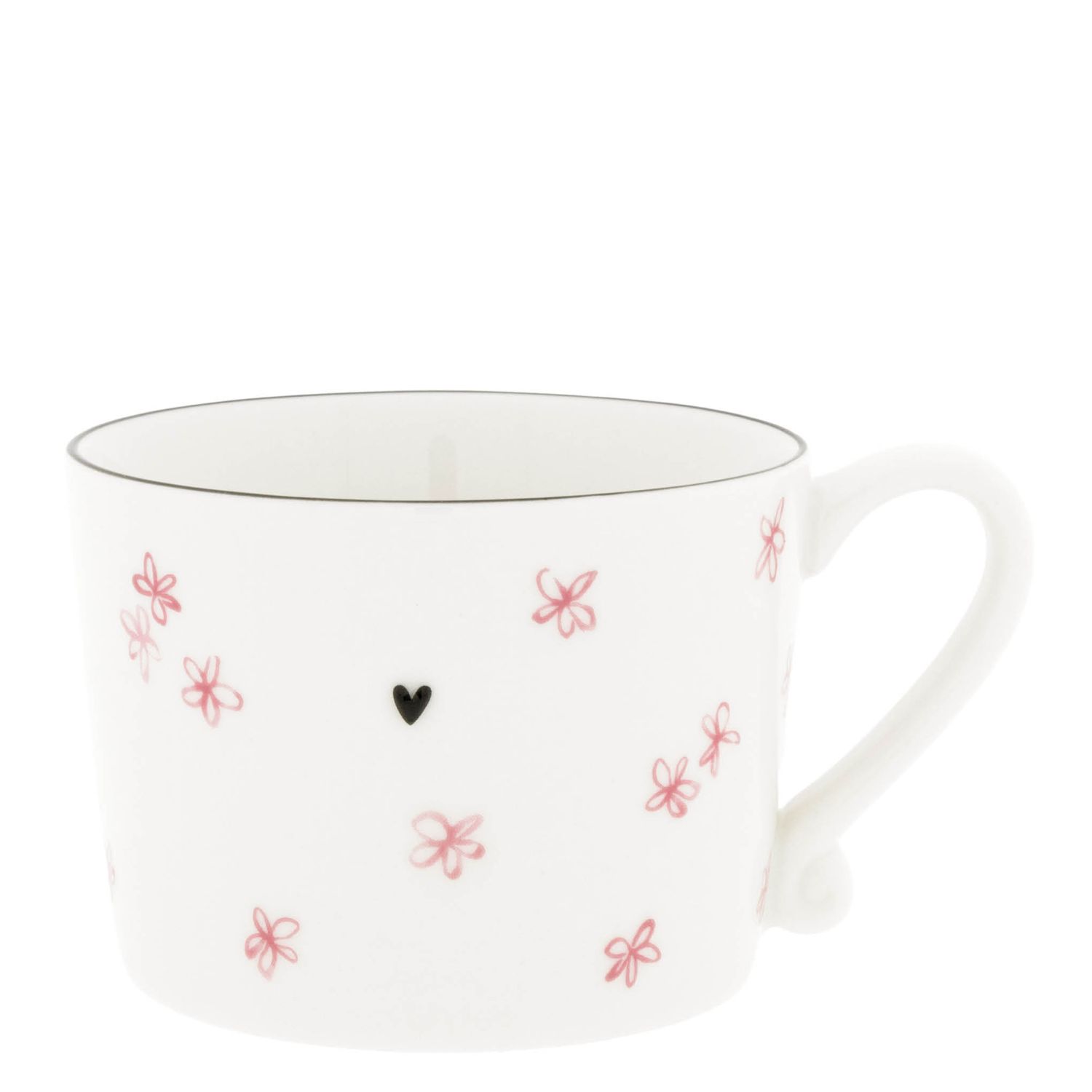 Weiße Tasse mit Henkel, rosa Blümchenmuster und kleinem schwarzen Herz
