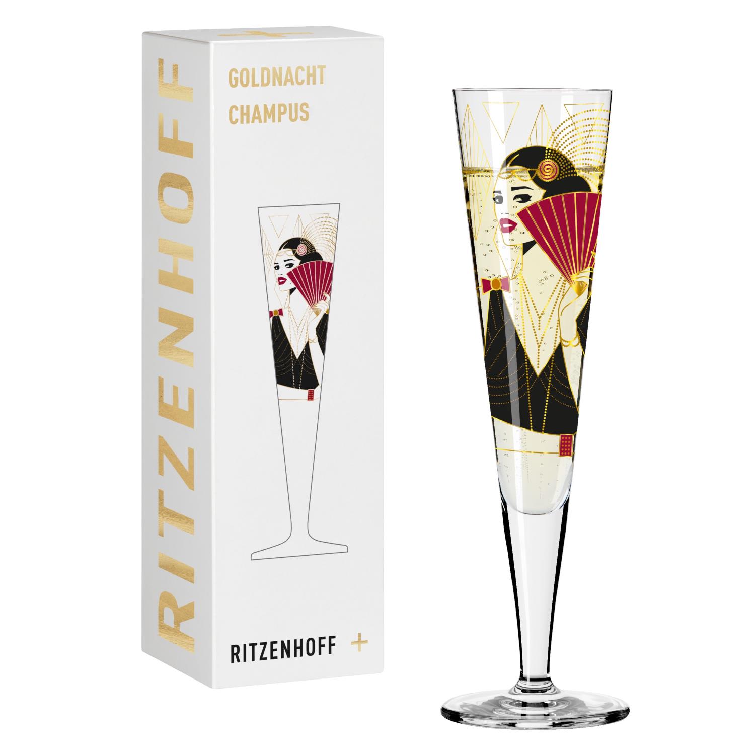 Ein Sektglas mit einer stilisierten Abbildung einer Frau und einer Verpackung mit goldenen Schriftzügen.