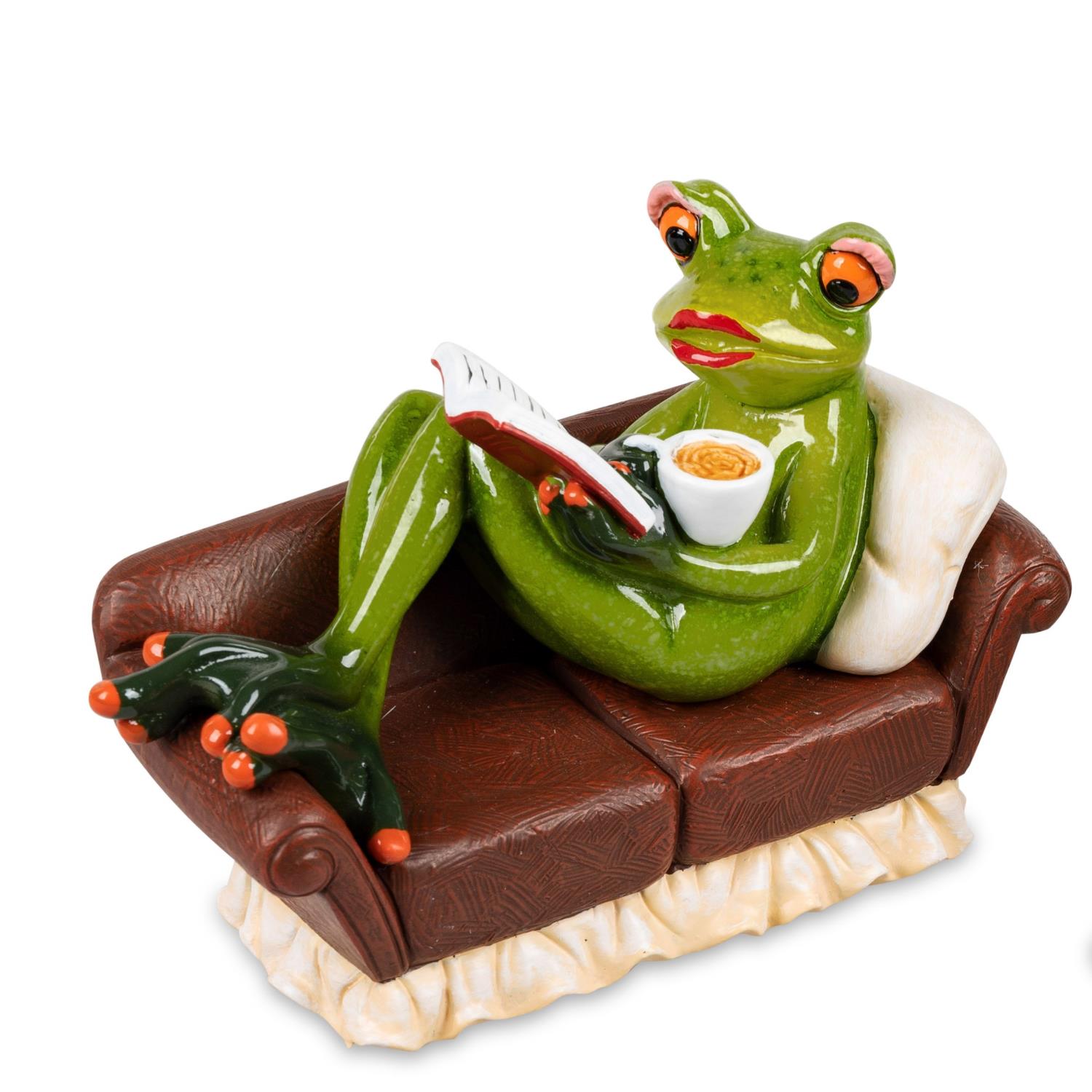 Eine grüne Froschfigur sitzt entspannt auf einer Couch, hält ein Buch in der einen und eine Schüssel