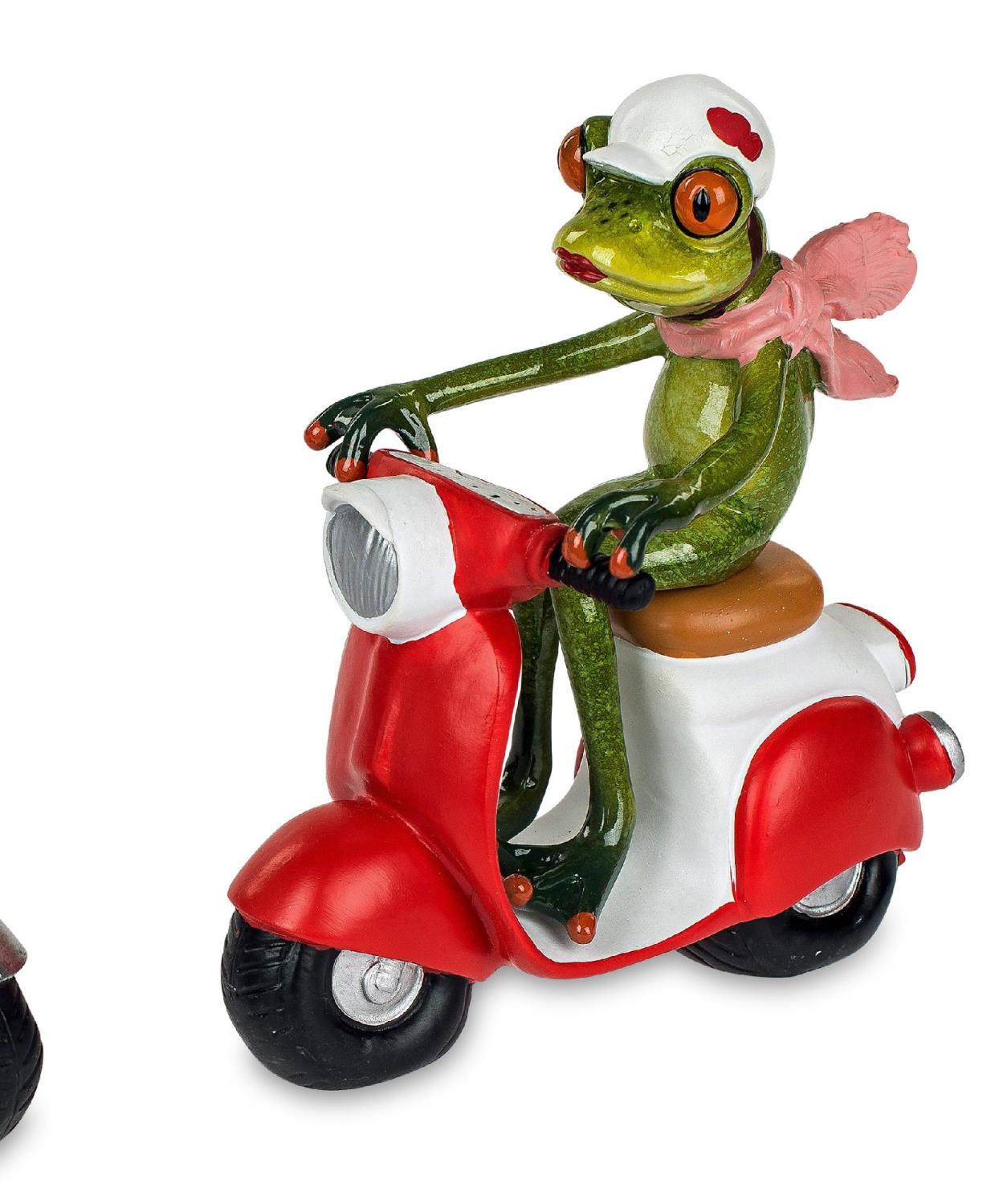 Eine grüne Froschfigur mit Sonnenbrille und Halstuch fährt auf einem roten Roller. Der Roller hat we