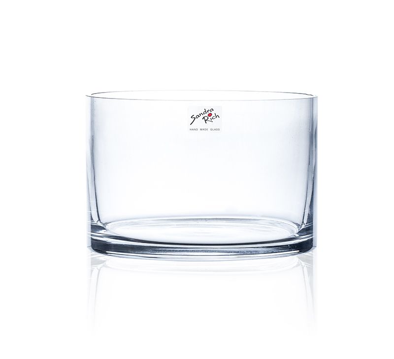 Transparentes, rundes Glasgefäß mit flachem Boden und einem Etikett auf der Seite.