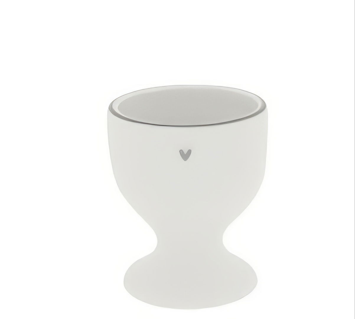 Weißer Eierbecher mit runder Form und einem schmalen Fuß. Eine kleine graue Markierung ist an der Vorderseite sichtbar.