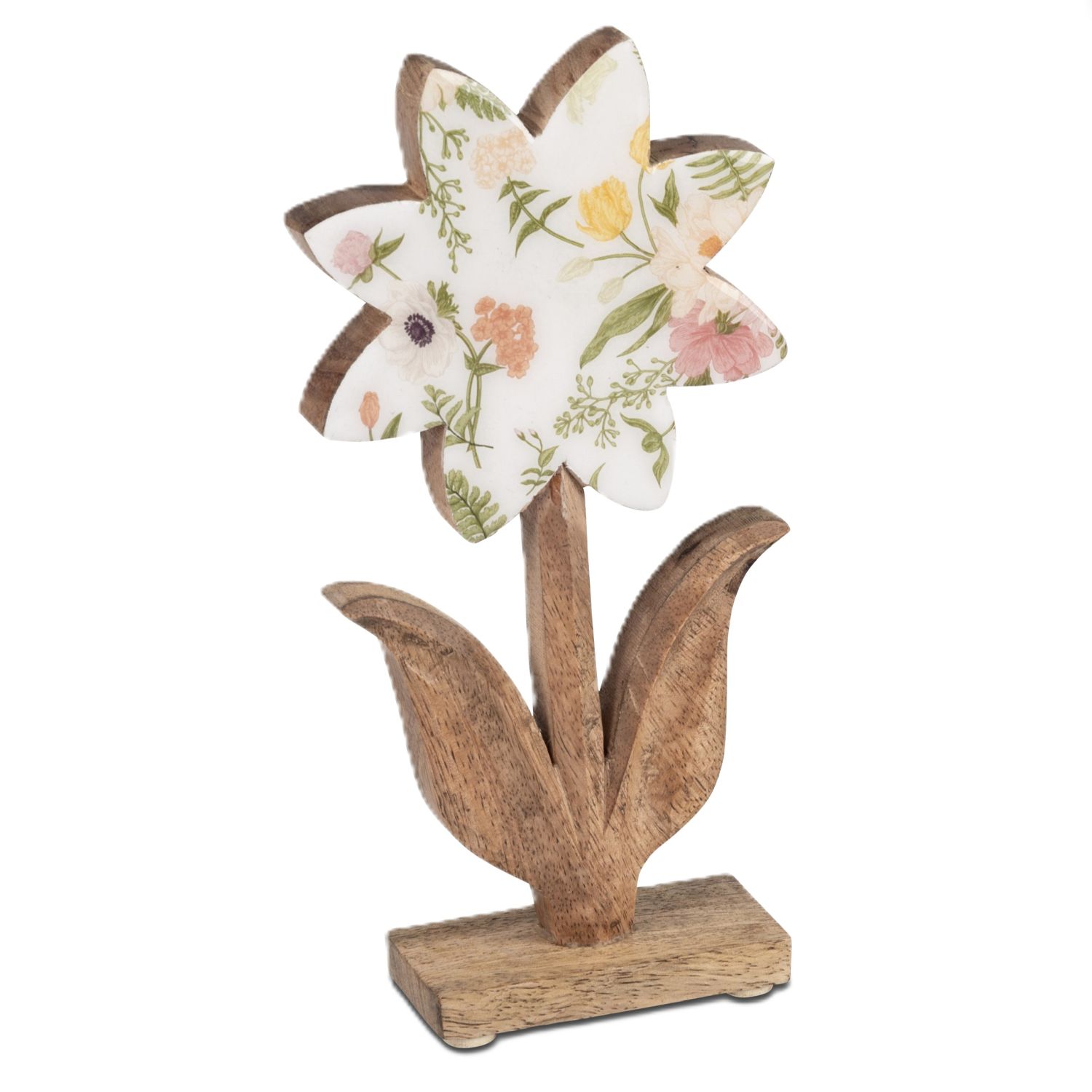 Holzblume auf Sockel mit weißer, blumig bedruckter Blüte und geschnitzten Blättern
