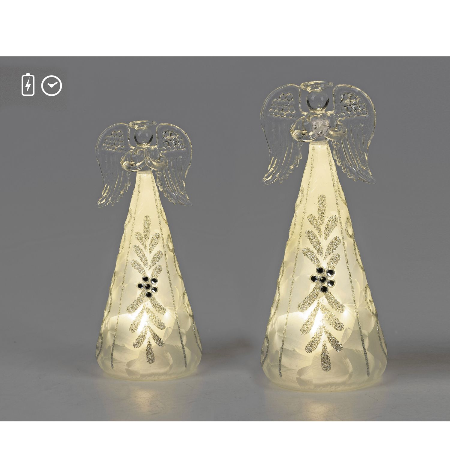 Zwei leuchtende Glasengel mit Flügeln und glitzerndem Muster vor grauem Hintergrund