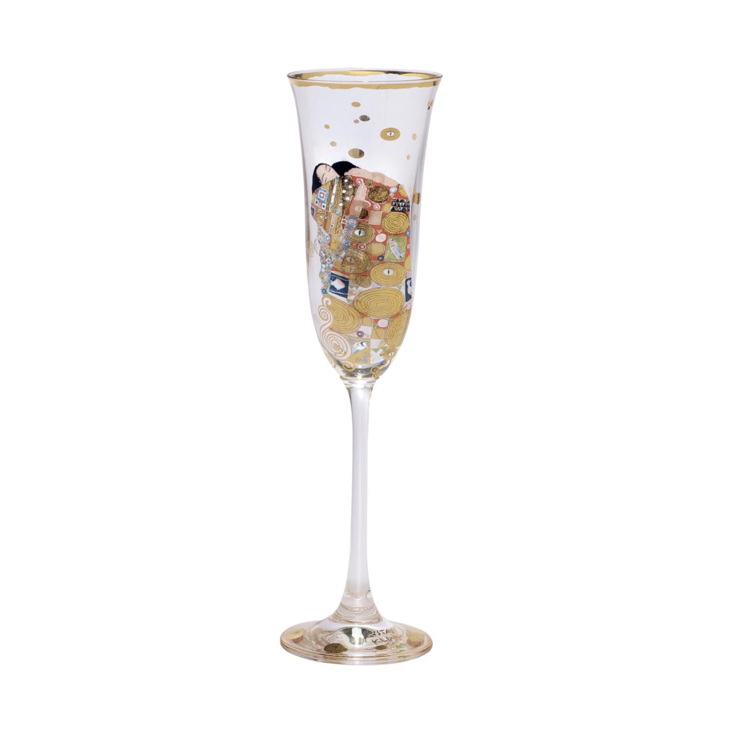 Ein schlanker Sektglas mit goldenen und bunten Mustern, verziert mit spiralförmigen und runden Elementen.
