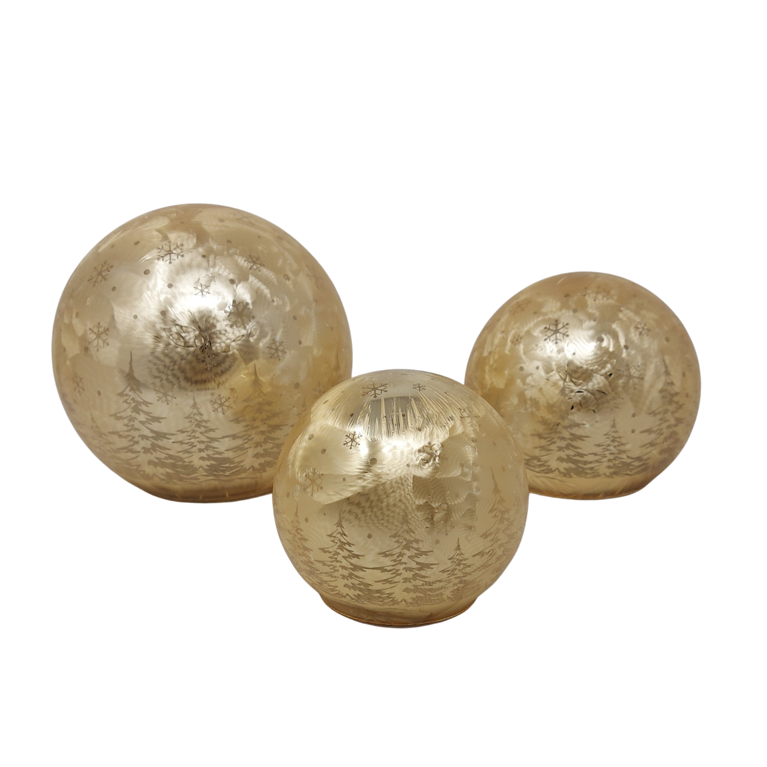 Drei Glaskugeln in verschiedenen Größen mit winterlichen Motiven