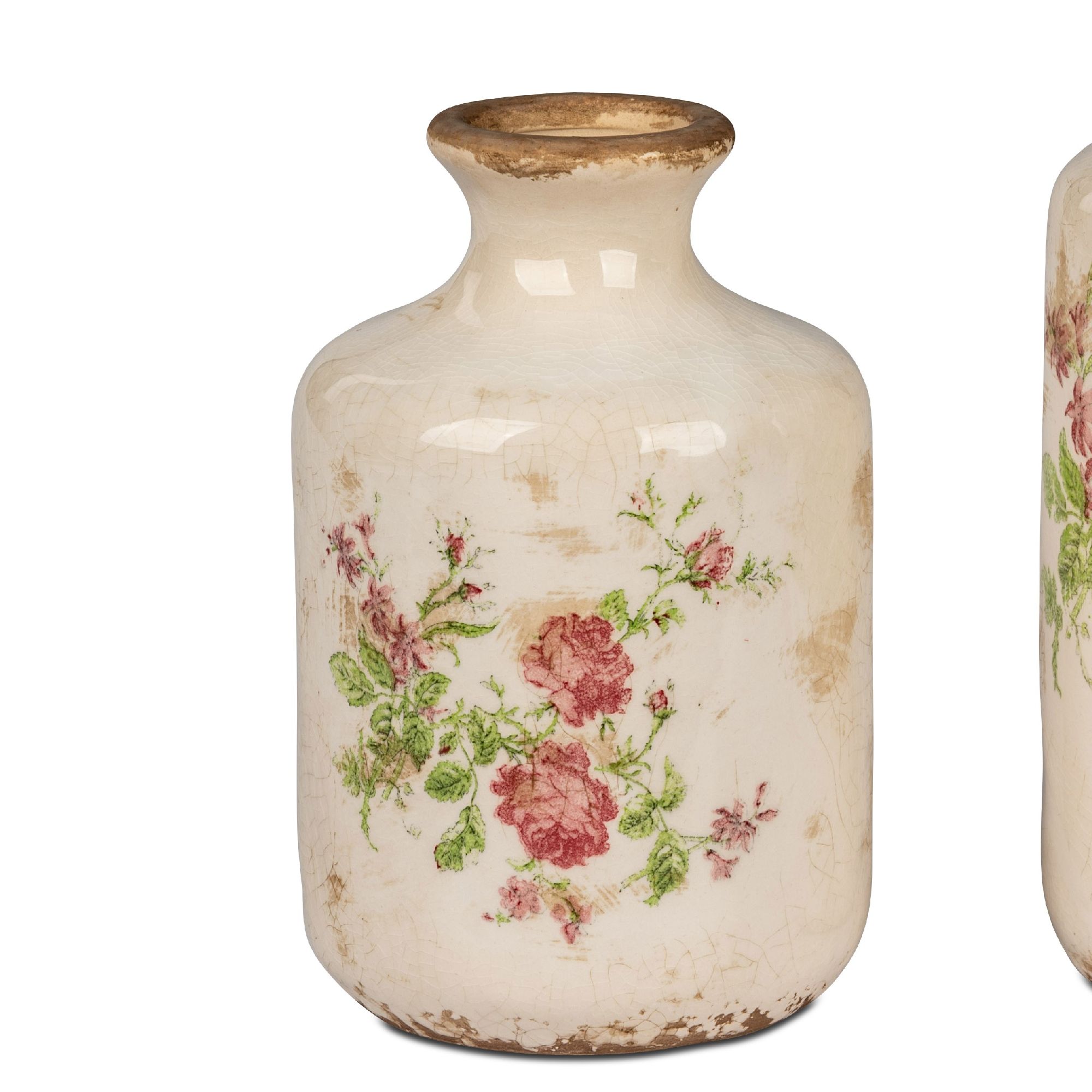 Zwei dekorative Vasen aus Keramik mit blütenförmigen Mustern in Rosa und Grün auf einer cremefarbenen Oberfläche.