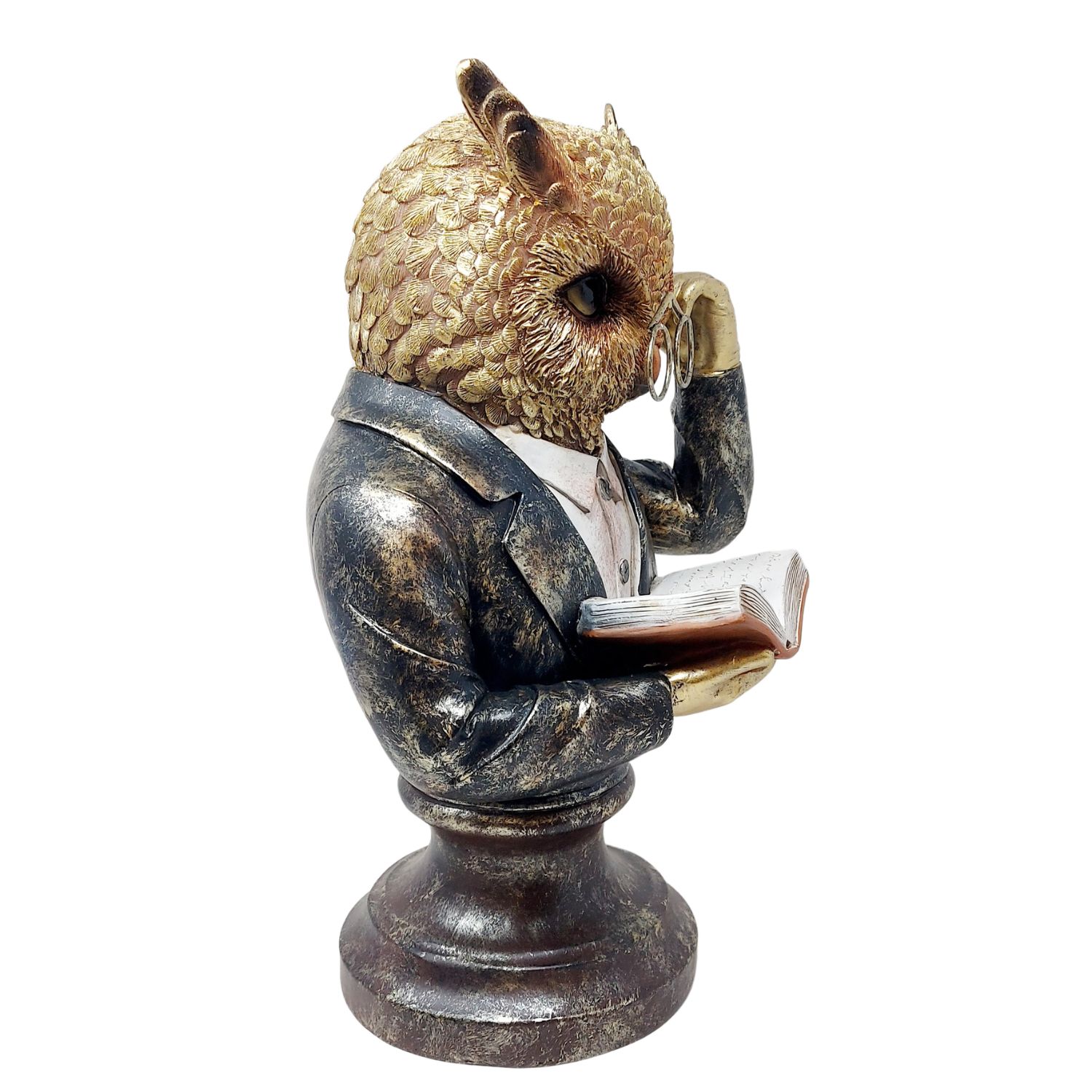 Skulptur einer Eule im Anzug mit Brille, die ein aufgeschlagenes Buch liest