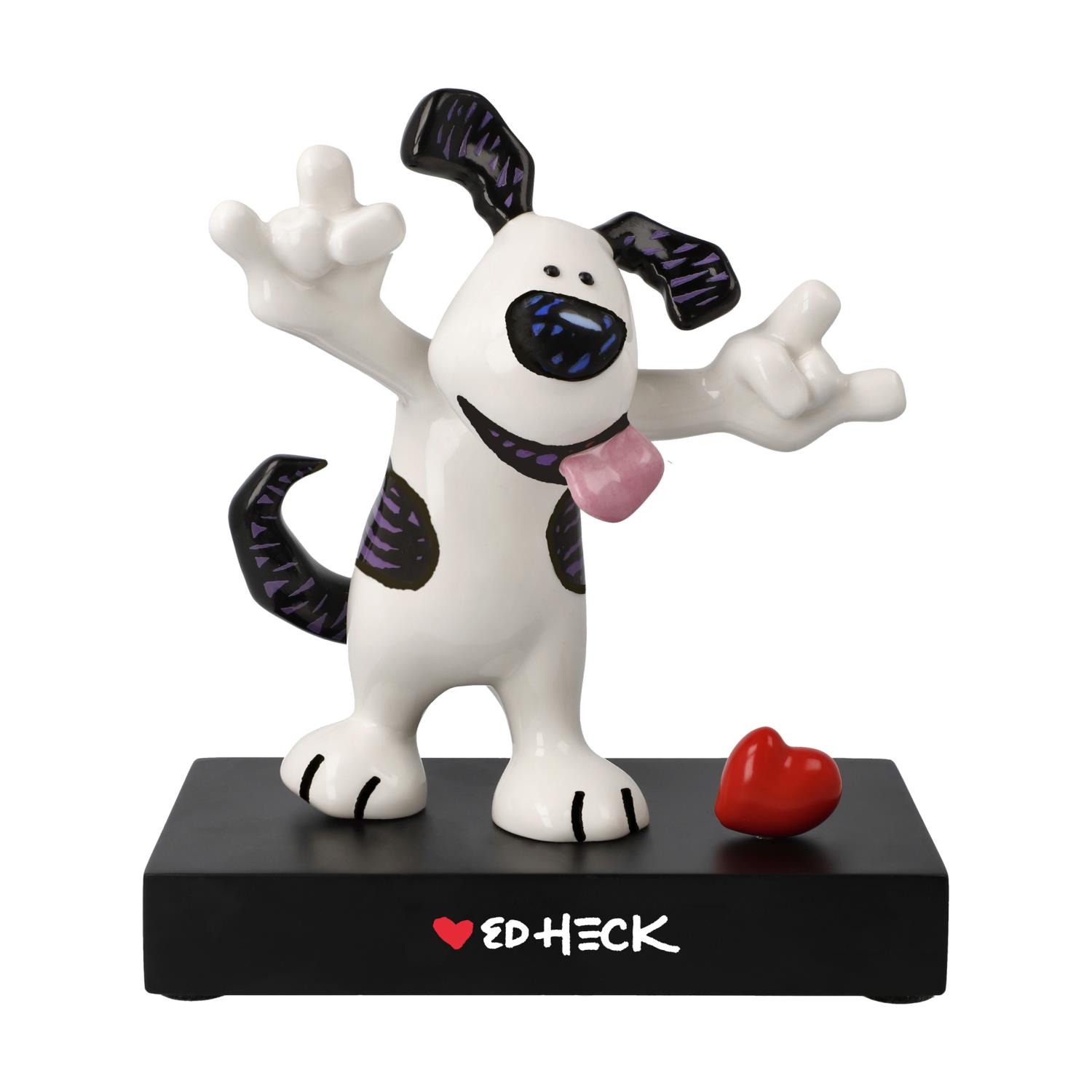 Eine bunte Hundefigur mit erhobenen Pfoten steht auf einer schwarzen Basis. Ein rotes Herz liegt daneben.